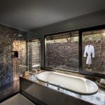 Family-cottage-bathroom-at-andBeyond-Phinda-Mountain-Lodge