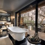 Guest-suite-bathroom-views-at-andBeyond-Phinda-Mountain-Lodge